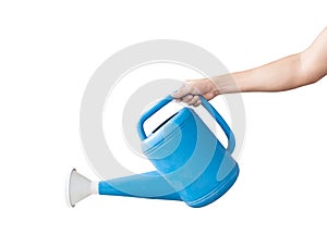 Hand holding a blue watering can, Isolated on white background with clipping path.