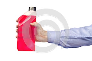 Hand Holding a Bottle of Antifreeze photo