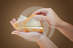 Hand holding bread