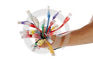 Hand is holding bunch of cables
