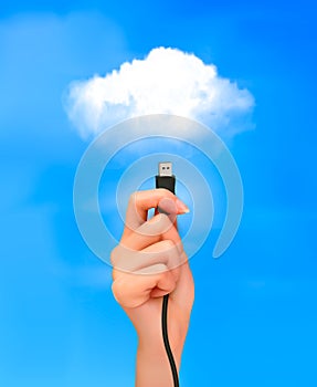 Hand holding cable connected to the cloud