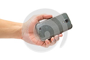 Hand holding camera side of cell phone isolated on white