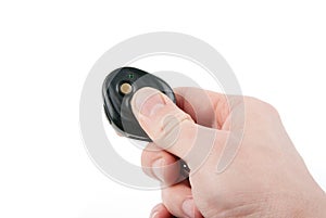 Hand holding car keys isolated