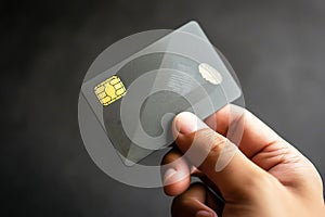 Hand Holding Card with Fingerprint Security Feature