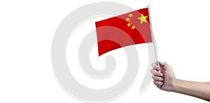 Hand holding Chinese flag. china flag in hand