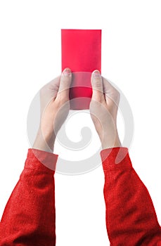 Hand holding chinese red envelope isolated on white background