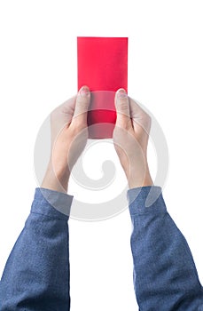 Hand holding chinese red envelope with money isolated over white background