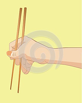 Hand holding chopstick