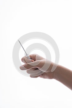 Hand holding circuit tester screwdriver on a white background photo