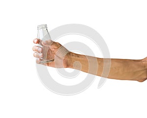 Hand holding clear bottle isolated on white background. Clipping path of transparent bottle