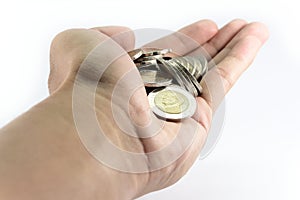 The hand holding the coins all over hand