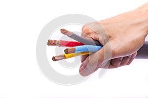 Hand holding colorful electrical cables