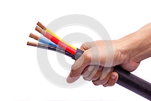 Hand holding colorful electrical cables