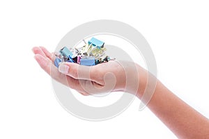 Hand holding colorful paper clips