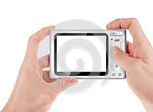 Hand holding a compact digital camera