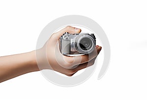Hand Holding Compact Digital Camera on White Background