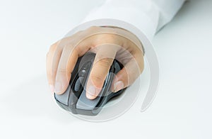 Hand holding computer wireless mouse