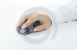 Hand holding computer wireless mouse isolated