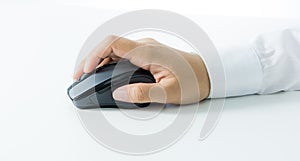 Hand holding computer wireless mouse isolated