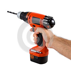 Hand holding cordless drill