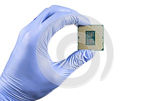 Hand holding a CPU in isolated white blackground