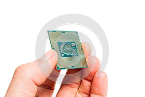 A hand holding cpu processor