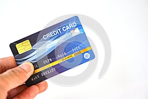 Hand holding credit card on white background - payment online shopping paying with credit card technology e wallet concept