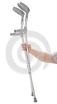 Hand holding crutches