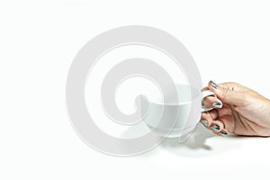 Hand holding a cup of coffee, on white