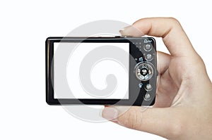 Hand holding digital camera rear view