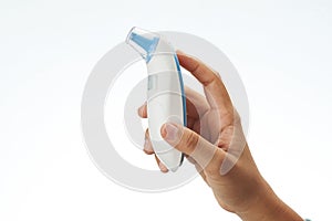 Hand holding digital thermometer