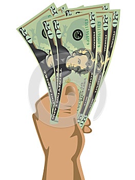 Hand holding dollar bills