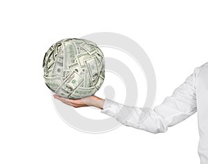 Hand holding dollars ball