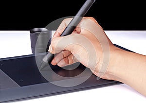 Hand holding Drawing Tablet for Graphic Designer