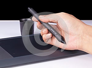 Hand holding Drawing Tablet for Graphic Designer