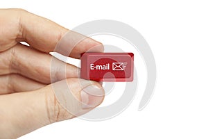 Hand holding e-mail computer key