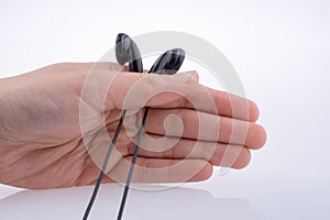Hand holding earphone