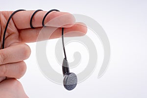 Hand holding earphone