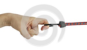 Hand holding elastic rope