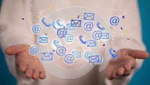 Hand holding email icons-communication and feedback concept