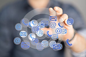 Hand holding email icons-communication and feedback concept