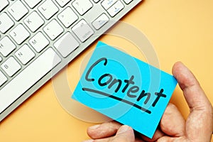 Hand holding engaging content card, Internet marketing