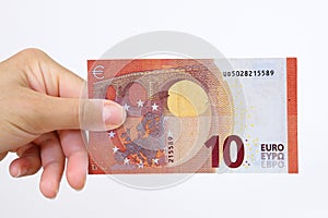 Hand holding a euro bank note on a white background