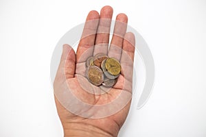 Hand holding Euro banknotes and coins on a white background - Money, Financial, saving, Growth concept