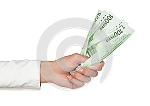 Hand holding euro currency