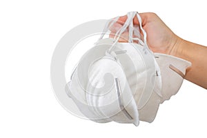 Hand holding Face mask or filtering facepiece respirator or breathing protection