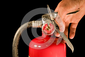 Hand Holding Fire Extinguisher