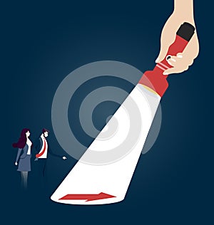 A hand holding a flashlight uncovering hidden arrow sign. Business concept vector