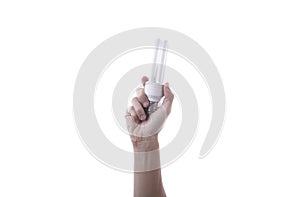 Hand holding fluorescent light bulb isolated on white background