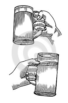 Hand holding a full glass of beer